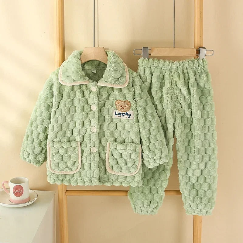 Ensemble de pyjama chanceux des enfants duvets