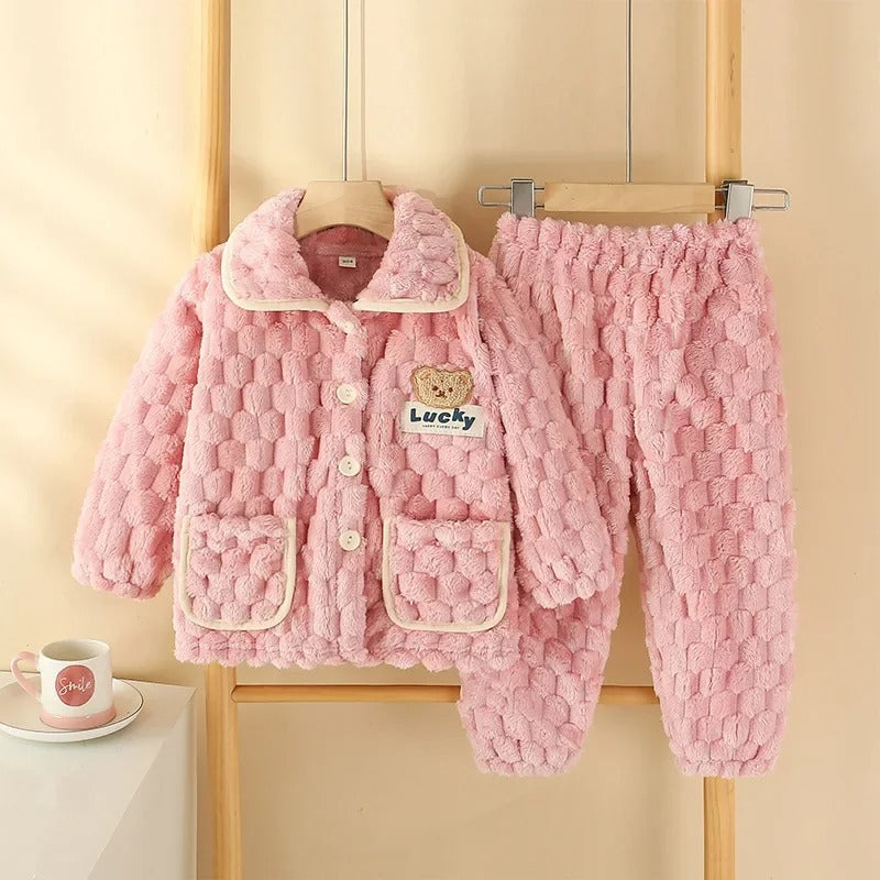 Ensemble de pyjama chanceux des enfants duvets