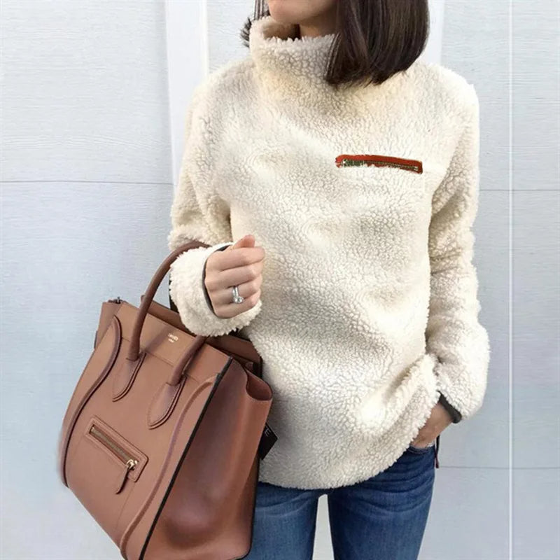 Pull à collier avec alimentation en peluche