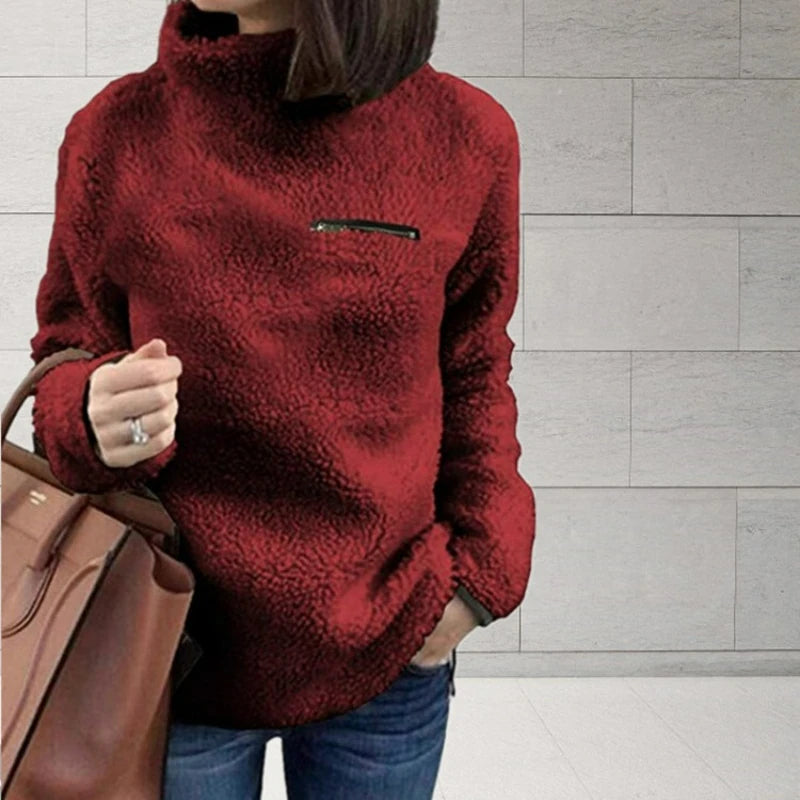 Pull à collier avec alimentation en peluche