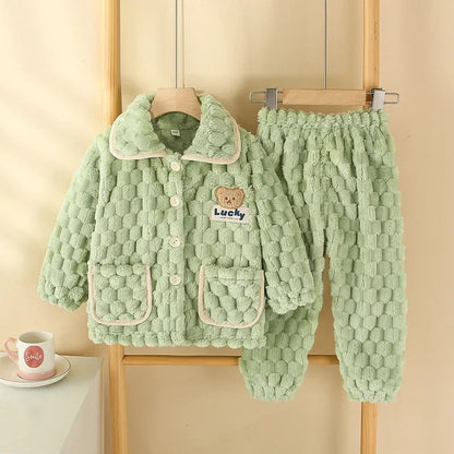 Ensemble de pyjama chanceux des enfants duvets