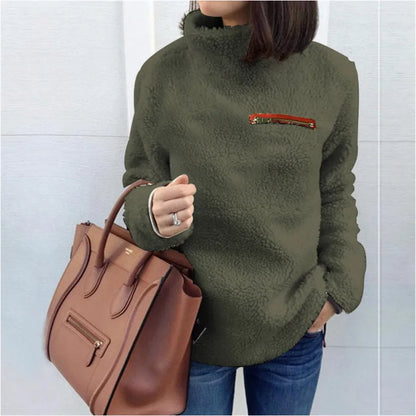 Pull à collier avec alimentation en peluche