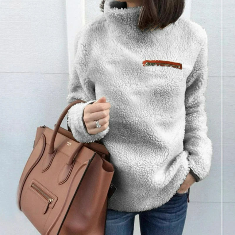 Pull à collier avec alimentation en peluche