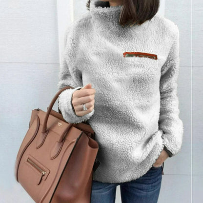 Pull à collier avec alimentation en peluche