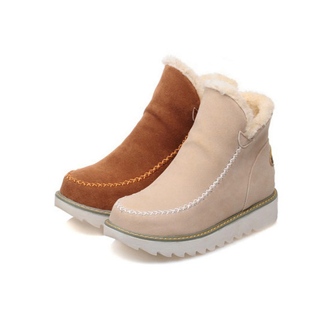 Bottes d'hiver des femmes nourries à la nourriture